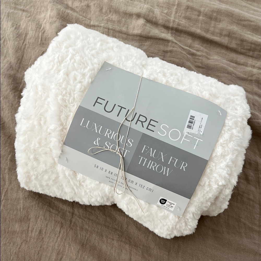 Plush Creamy White Faux Fur Blanket